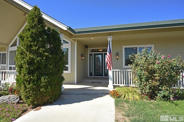 45 Lower Colony Rd, Wellington, NV 89444 - view of exterior entry with covered porch and roof with shingles