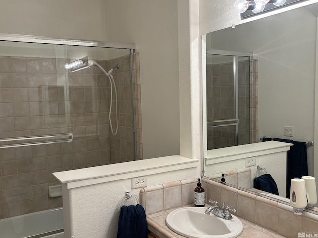 10316 Sterling View Ct, Reno, NV 89521 - bathroom featuring vanity and combined bath / shower with glass door