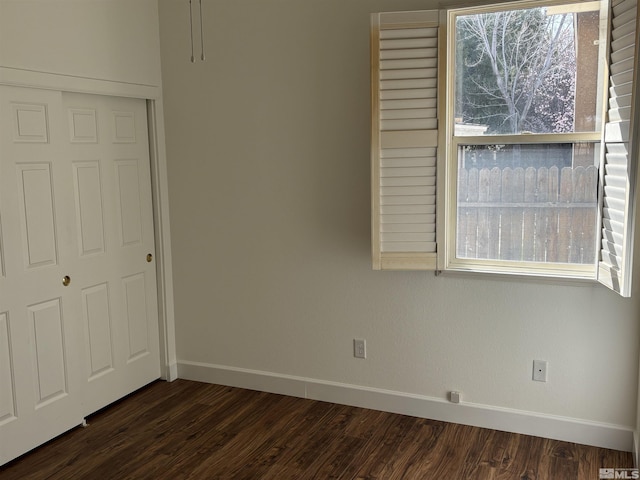 10316 Sterling View Ct, Reno, NV 89521 - unfurnished bedroom featuring baseboards, dark wood-style floors, and a closet