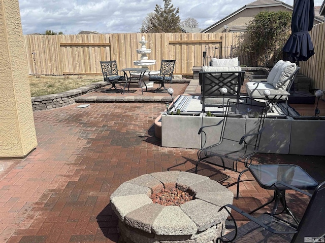 10316 Sterling View Ct, Reno, NV 89521 - view of patio / terrace featuring an outdoor living space with a fire pit