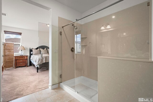 9726 Pachuca Dr, Reno, NV 89521 - bathroom with a shower stall, connected bathroom, and tile patterned flooring