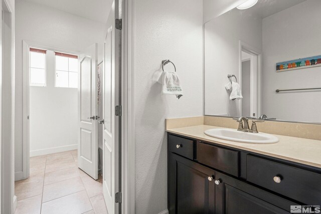 9726 Pachuca Dr, Reno, NV 89521 - bathroom with vanity and tile patterned floors
