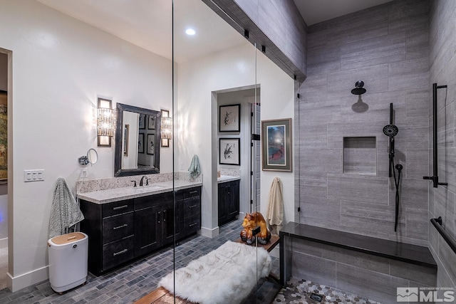720 Marewood Trl, Reno, NV 89511 - bathroom featuring vanity, walk in shower, and baseboards
