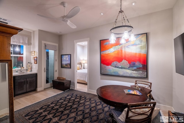 720 Marewood Trl, Reno, NV 89511 - interior space featuring wood finished floors, connected bathroom, baseboards, vanity, and recessed lighting
