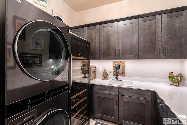 720 Marewood Trl, Reno, NV 89511 - laundry room with stacked washer / dryer and cabinet space