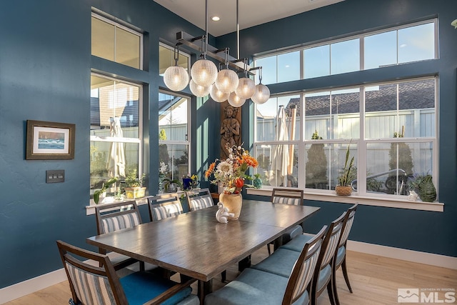 720 Marewood Trl, Reno, NV 89511 - dining space with wood finished floors, baseboards, and recessed lighting
