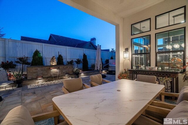 720 Marewood Trl, Reno, NV 89511 - view of patio / terrace with a fenced backyard and outdoor dining space