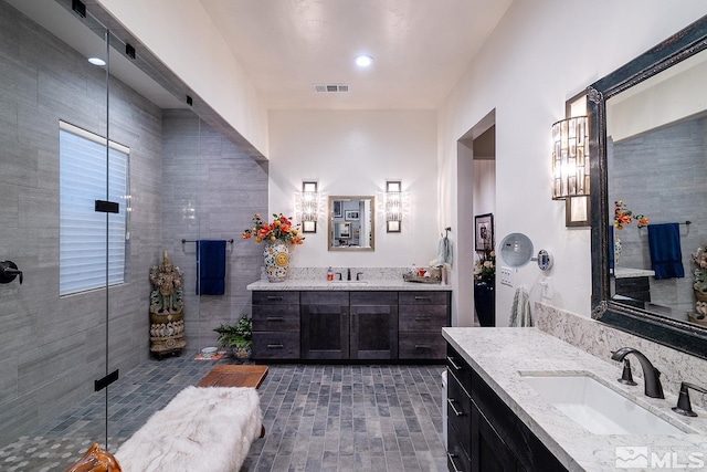 720 Marewood Trl, Reno, NV 89511 - full bath featuring two vanities and a shower with shower door