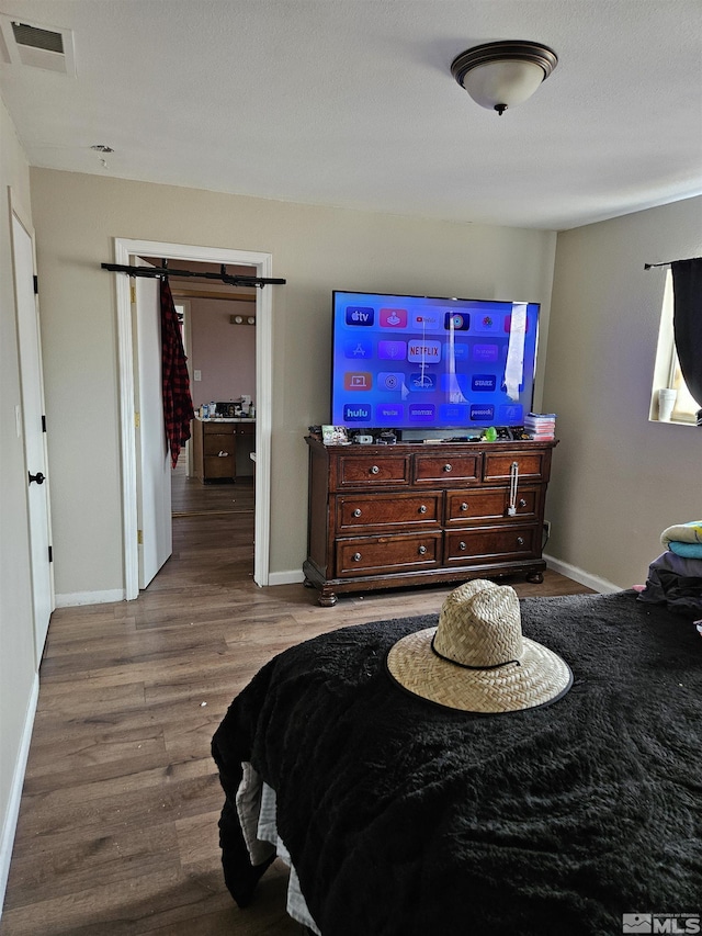 1391 Langley Dr, Gardnerville, NV 89460 - bedroom with wood finished floors and baseboards