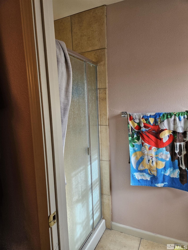 1391 Langley Dr, Gardnerville, NV 89460 - full bathroom featuring a shower stall and tile patterned flooring