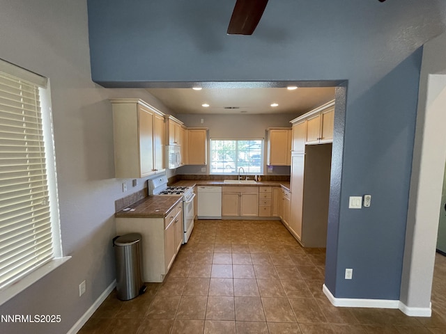 158 Desert Springs Ln, Fernley, NV 89408 - kitchen with white appliances, a sink, a ceiling fan, baseboards, and recessed lighting