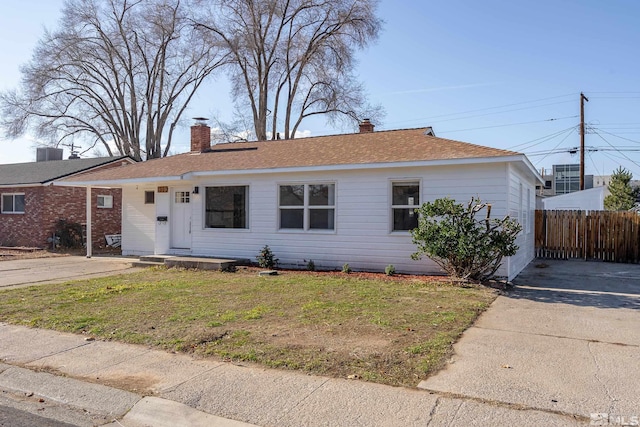 939 Bates Ave, Reno, NV 89502 - ranch-style house featuring concrete driveway, a chimney, and cooling unit