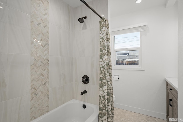 939 Bates Ave, Reno, NV 89502 - bathroom with shower / tub combo with curtain, vanity, and baseboards
