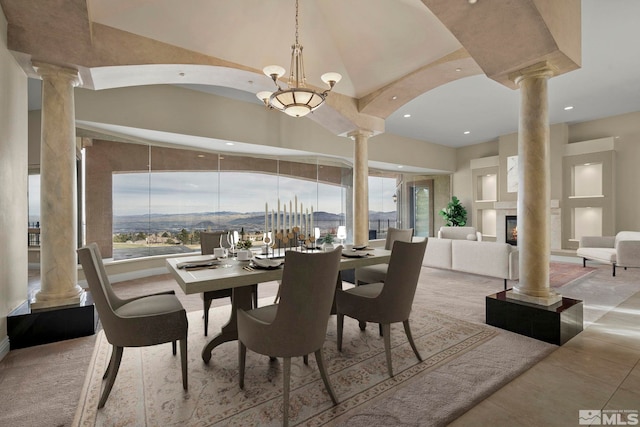 1150 Eagle Vista Ct, Reno, NV 89511 - dining room with decorative columns, plenty of natural light, recessed lighting, and a high ceiling