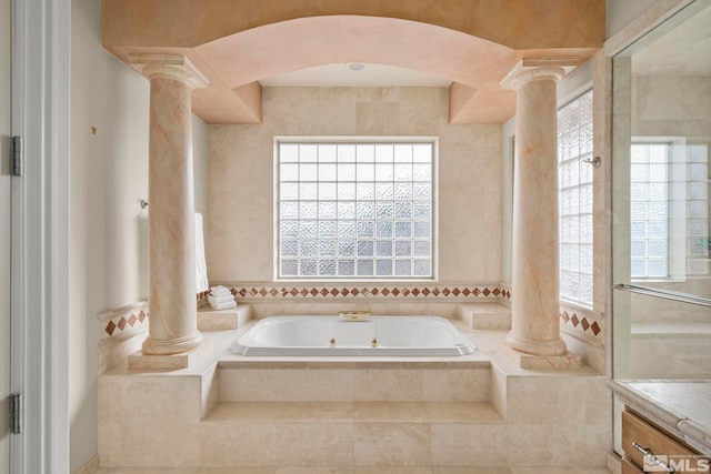 1150 Eagle Vista Ct, Reno, NV 89511 - full bathroom with decorative columns and a tub with jets