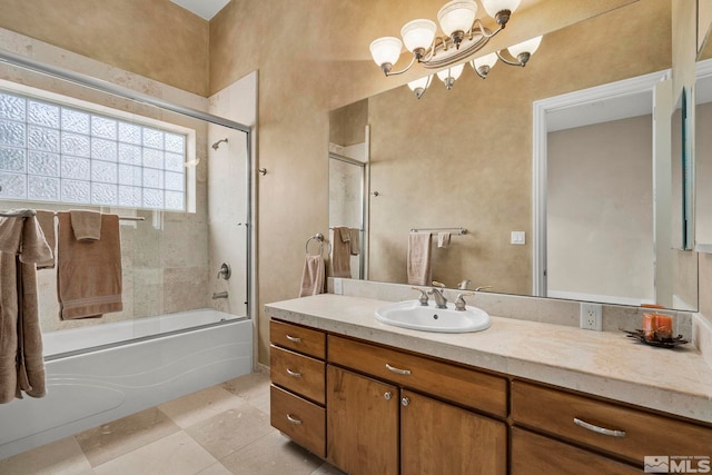 1150 Eagle Vista Ct, Reno, NV 89511 - bathroom with a chandelier, bath / shower combo with glass door, vanity, and tile patterned flooring