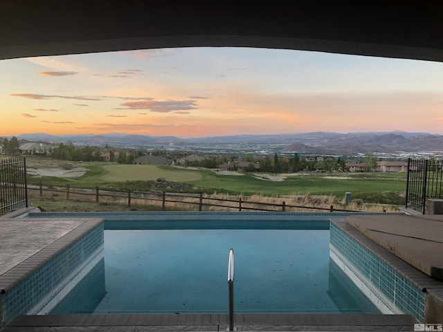 1150 Eagle Vista Ct, Reno, NV 89511 - outdoor pool with view of golf course, fence, and a mountain view