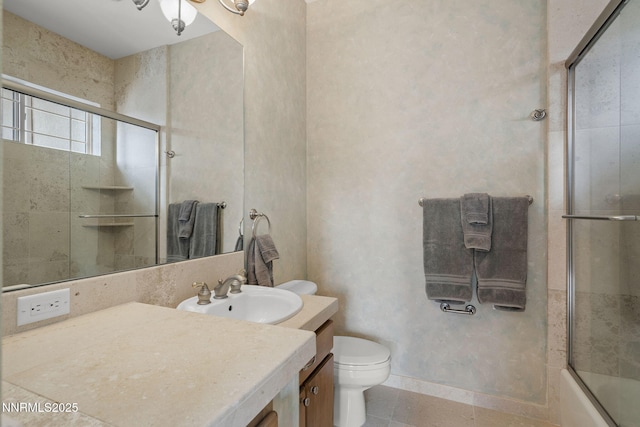 1150 Eagle Vista Ct, Reno, NV 89511 - full bathroom with vanity, tile patterned flooring, and combined bath / shower with glass door