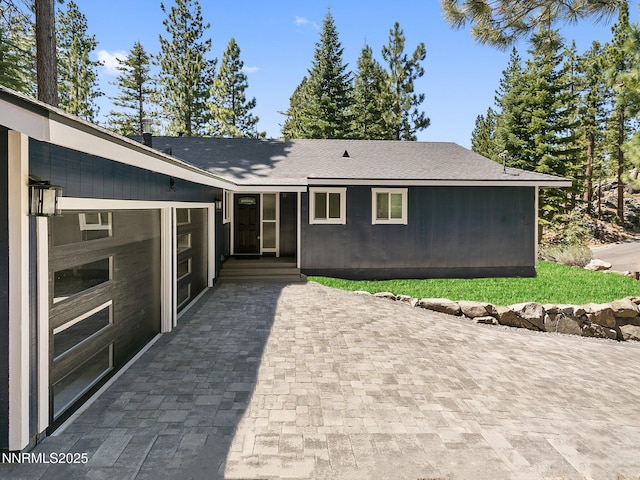 421 Edgewood Dr, Stateline, NV 89449 - view of front facade featuring a garage and driveway
