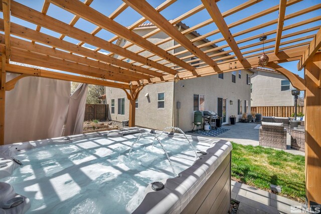 485 Sondrio Ct, Reno, NV 89521 - view of patio / terrace featuring a hot tub, a fenced backyard, area for grilling, and a pergola