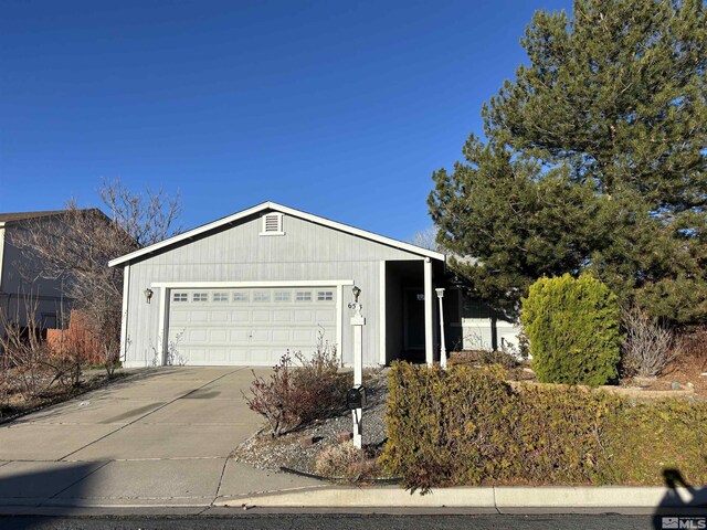 6515 Galice Ct, Sun Valley, NV 89433 - view of front of house with driveway and a garage
