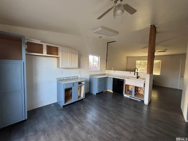 6515 Galice Ct, Sun Valley, NV 89433 - kitchen with ceiling fan, plenty of natural light, dark wood-style flooring, and light countertops