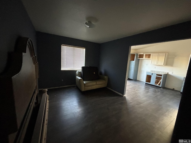 6515 Galice Ct, Sun Valley, NV 89433 - living area featuring baseboards and dark wood-type flooring