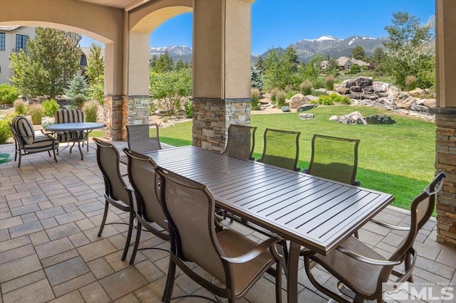 6645 De Chardin Ln, Reno, NV 89511 - view of patio / terrace featuring outdoor dining space and a mountain view