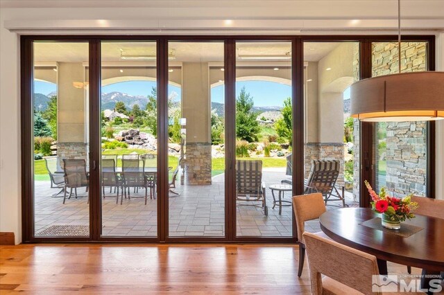 6645 De Chardin Ln, Reno, NV 89511 - doorway to outside with wood finished floors