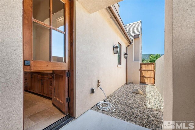 6645 De Chardin Ln, Reno, NV 89511 - view of side of home with stucco siding
