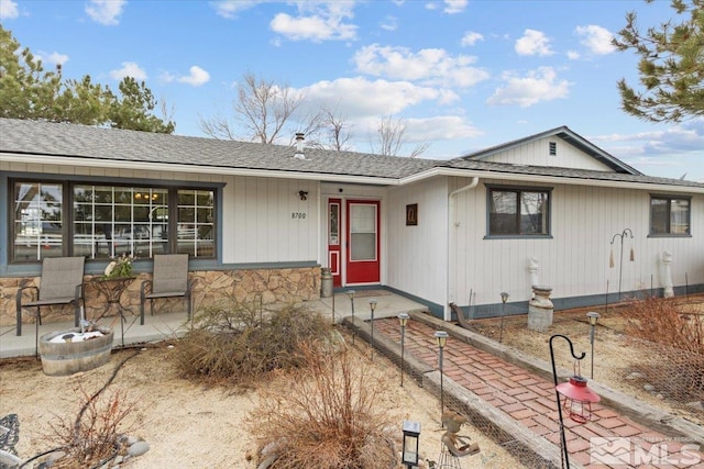 8700 Little Creek Rd, Reno, NV 89508 - single story home featuring stone siding and a shingled roof