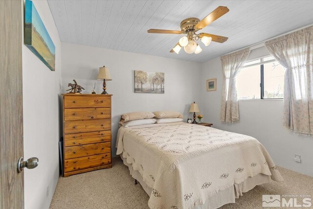 8700 Little Creek Rd, Reno, NV 89508 - bedroom featuring light carpet, ceiling fan, and wood ceiling