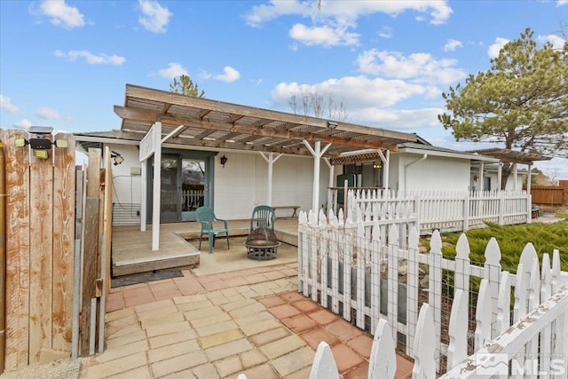 8700 Little Creek Rd, Reno, NV 89508 - view of patio with a fire pit, fence, and a deck