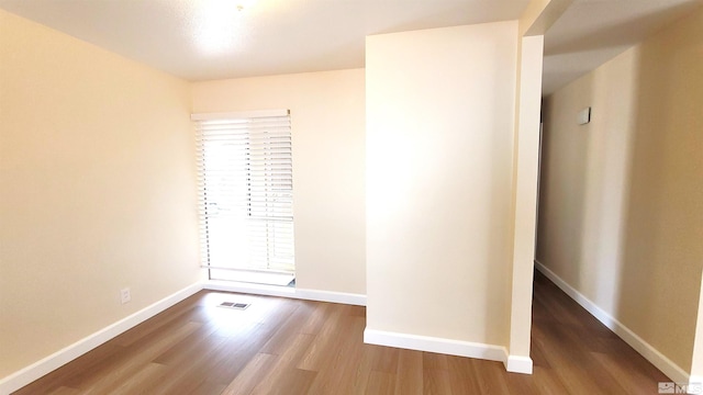 1285 Rayburn Dr, Reno, NV 89503 - spare room with wood finished floors and baseboards
