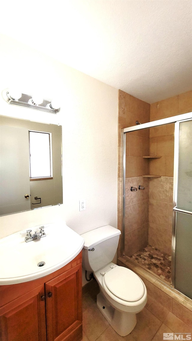1285 Rayburn Dr, Reno, NV 89503 - bathroom with tile patterned floors and a stall shower