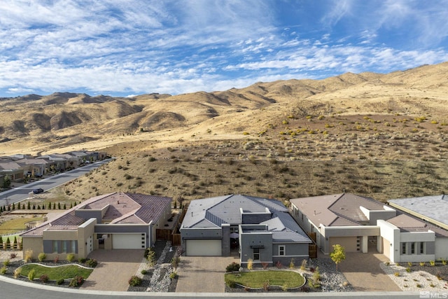 view of mountain background featuring nearby suburban area