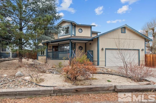 3920 W 7th St, Reno, NV 89503 - view of front of house with a porch, a garage, and concrete driveway