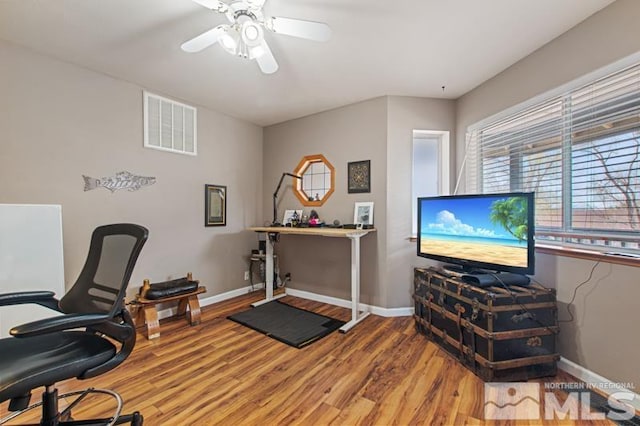 3920 W 7th St, Reno, NV 89503 - office featuring a ceiling fan, wood finished floors, and baseboards