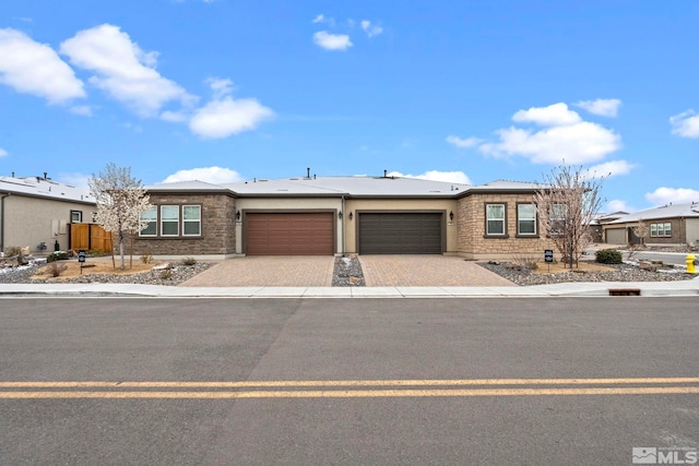 7393 Oakmont Ln, Sparks, NV 89441 - prairie-style home with a garage and decorative driveway