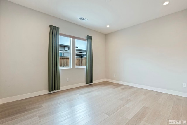 7393 Oakmont Ln, Sparks, NV 89441 - spare room featuring light wood-style floors, baseboards, and recessed lighting