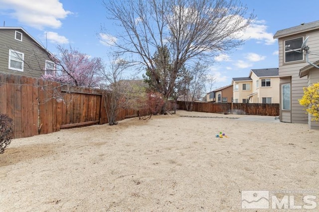 7655 Los Lagos Ave, Sparks, NV 89436 - fenced backyard with a residential view
