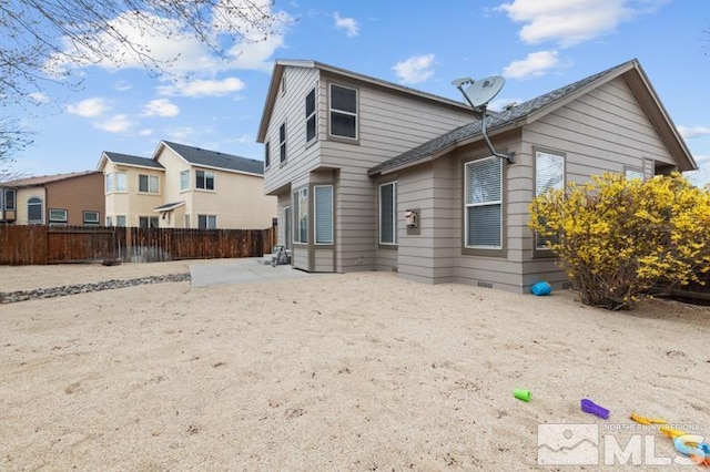 7655 Los Lagos Ave, Sparks, NV 89436 - back of property with fence and a patio