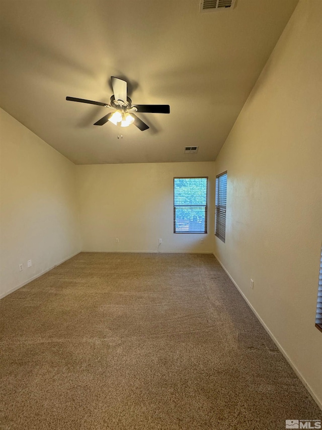 7655 Los Lagos Ave, Sparks, NV 89436 - carpeted empty room featuring a ceiling fan and lofted ceiling