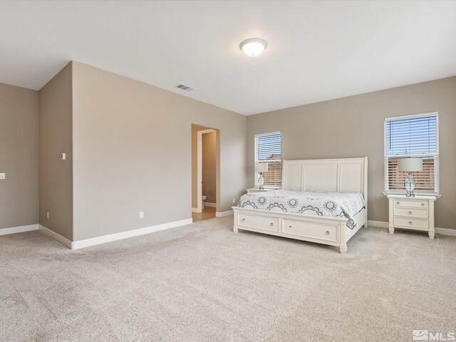 11641 Vista Park Dr, Sparks, NV 89441 - bedroom featuring light carpet and baseboards