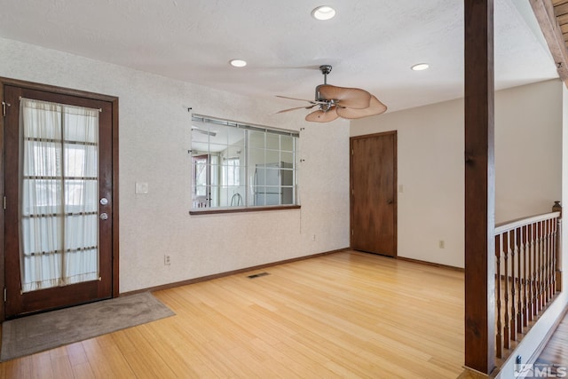 2266 W Washington St, Carson City, NV 89703 - foyer entrance featuring wood finished floors, ceiling fan, healthy amount of natural light, baseboards, and recessed lighting