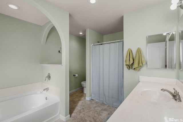18190 Cody Ct, Reno, NV 89508 - full bath with toilet, a bath, recessed lighting, vanity, and baseboards