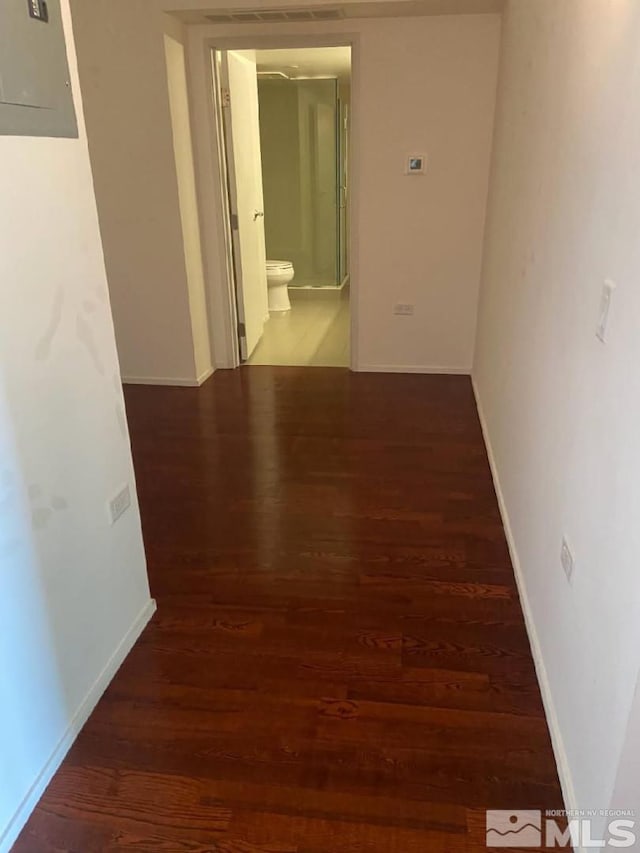255 N Sierra St Unit 1709, Reno, NV 89501 - corridor featuring electric panel, wood finished floors, and baseboards