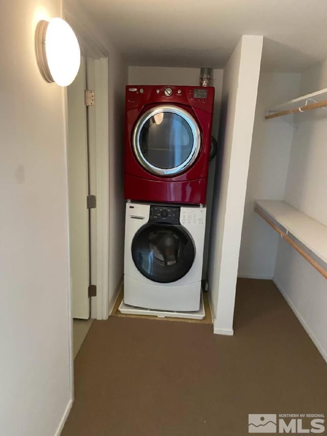 255 N Sierra St Unit 1709, Reno, NV 89501 - laundry area featuring stacked washer / drying machine and baseboards