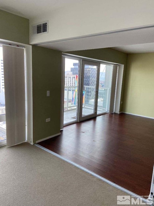255 N Sierra St Unit 1709, Reno, NV 89501 - empty room featuring baseboards and wood finished floors