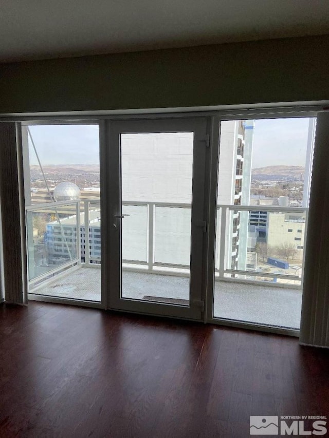 255 N Sierra St Unit 1709, Reno, NV 89501 - doorway to outside with dark wood-style floors and healthy amount of natural light